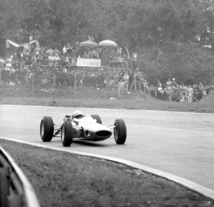 John Surtees Britain s John Surtees pictured in action in his factory-entered Ferrari during the Italian Grand Prix at Monza. Surtees won the race ahead of Bruce McLaren in a Cooper and Lorenzo Bandini in a 12 cylinder factory Ferrari. 6th September 1964. Italy  Copyright: xTopFotox 0200835