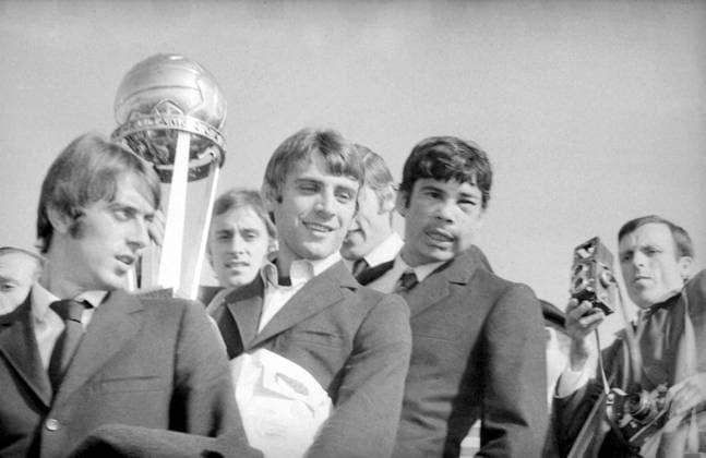 Milan Players of the Milan Soccer team show the International Continental Cup of Champions after their arrival from Buenos Aires, where they played against Estudiantes of La Plata in the second match for the final of the International tournament. From left to right are, Girogio, Rognoni, Roberto, Pierino, Prati, and Argentine born Nestor Combin, whose face is swollen following a fight he had during the match. 24th October 1969. Argentina  Copyright: xTopFotox 0241195