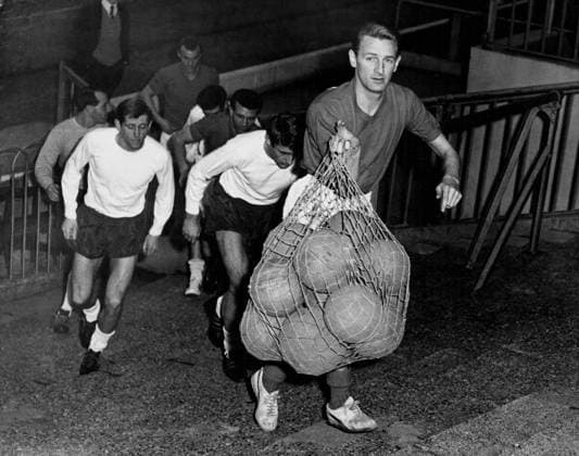 George Eastham George Eastham, who is on the transfer list from Arsenal, and who is playing in the team to meet West Germany arrives at Highbury with a set of footballs for the traininjg session. 21st February 1966 Great Britain  Copyright: xTopFotox 0518698