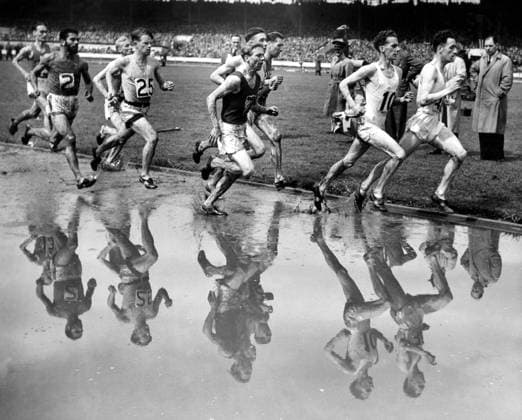 British Games A heavy downpour made conditions tough for competitors on the final day of the British Games held at White City. Here is the field seen in the one mile event. 2nd June 1952 Great Britain  Copyright: xTopFotox 0549698
