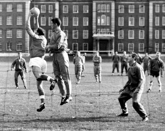 England England in training at Roehampton - Tony Waiters, the reserve goalkeeper goes up to take the ball from the head of centre-back Labone, watched by Joe Baker (right), during a move from a corner by Terry Paine. 21st October 1963 Great Britain  Copyright: xTopFotox 0552139
