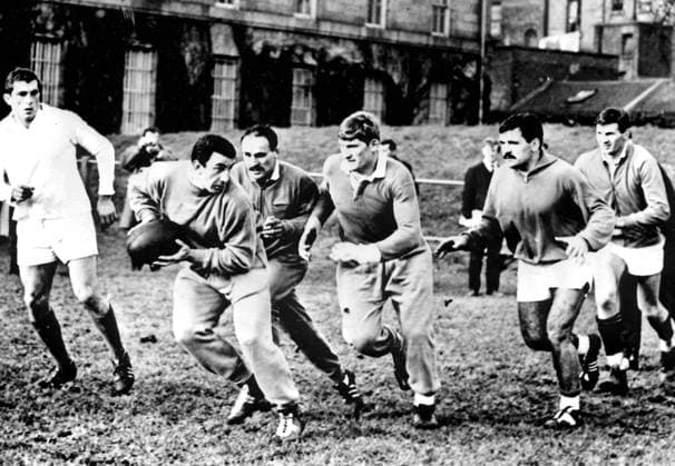 French Rugby practise Dublin, Eire: French Rugby practice - Jaques Berejnoi (prop forward) pases with left to right Benoit Dauga, M. Crauste (captain), Walter Spangher in pursuit. 22nd January 1965 Great Britain  Copyright: xTopFotox 0581689