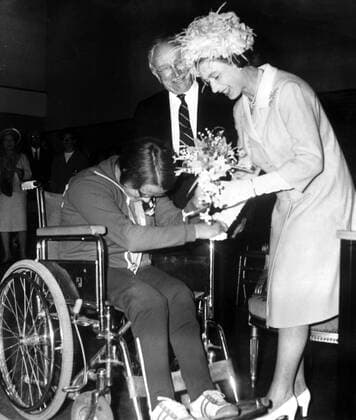 Queen and Paralympics Her Majesty Queen Elizabeth II is presented with a bouquet by thirteen-year-old Bente Gronli from Trondheim , Norway after opening a new £300,000 sports stadium for the paralysed and other disabled persons built on a site adjoining Stoke Mandeville hospital . During her visit she watched the International Games for Paraplegics - the Wheelchair Olympics 4th August 1969 United Kingdom England  Copyright: xTopFotox 1279453