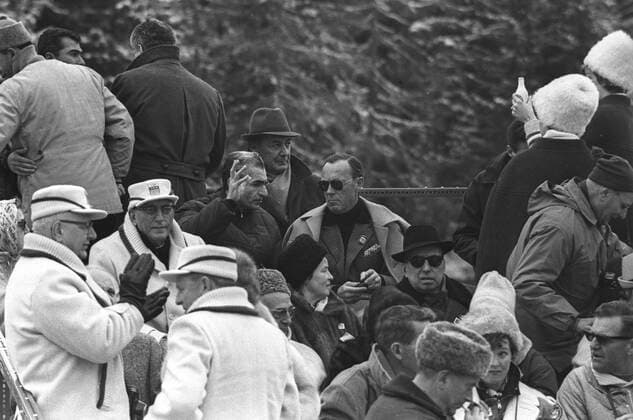 Spectators Winter Olympics Prince Bernhard of the Netherlands ( centre , dark glasses ) , and the Shah of Persia ( hand raised ) pictured amidst the spectators as they watched the ladies slalom event at the Winter Olympic Games, Olympische Spiele, Olympia, OS in Innsbruck . 3rd February 1964 Austria  Copyright: xTopFotox UPI470932