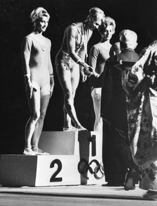 Gymnastics Olympic Games, Olympische Spiele, Olympia, OS Larisa Latynina , of the Soviet Union is congratulated by an Olympic official on the podium during medal awarding ceremonies for the women s floor exercise individual competition of the gymnastics event . 25th October 1964 Japan  Copyright: xTopFotox UPI487329