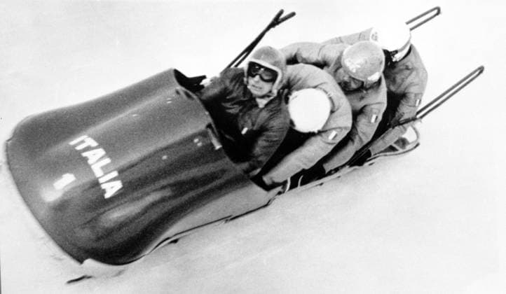Second and last heat for the Bobsleigh 4 man. The Italian bob seen here driven by Eugenio Monti , Roberto Zandonella , Mario Armano , and braker Luciano De Paolis flashing through bend 12 to cross the finish line and win the gold meal France  Copyright: xTopFotox UPI550975