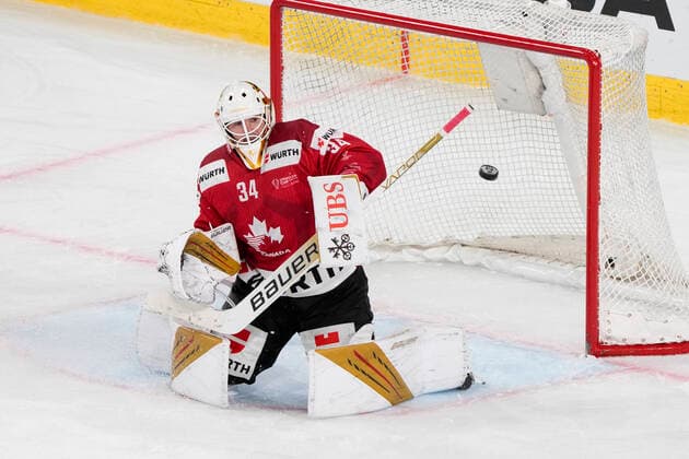 DAVOS, SWITZERLAND - DECEMBER 29: goalkeeper Michael Hutchinson of Team Canada in action during the match between Orebro HK and Team Canada at Eisstadion Davos on December 28, 2022 in Davos, Switzerland. Davos Graubunden Switzerland Copyright: xJustPictures.ch JarixPestelaccix