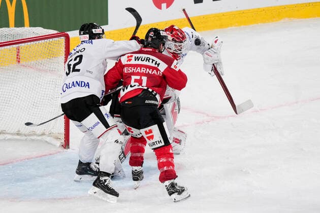 DAVOS, SWITZERLAND - DECEMBER 29: goalkeeper Jonas Arntzen of Örebro HK saves during the match between Orebro HK and Team Canada at Eisstadion Davos on December 28, 2022 in Davos, Switzerland. Davos Graubunden Switzerland Copyright: xJustPictures.ch JarixPestelaccix