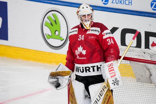DAVOS, SWITZERLAND - DECEMBER 29: goalkeeper Michael Hutchinson of Team Canada waiting the referee during the match between Orebro HK and Team Canada at Eisstadion Davos on December 28, 2022 in Davos, Switzerland. Davos Graubunden Switzerland Copyright: xJustPictures.ch JarixPestelaccix