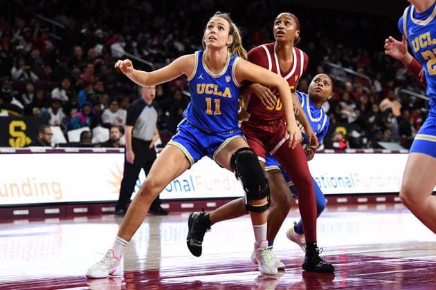 LOS ANGELES, CA - DECEMBER 15: UCLA Bruins forward Emily Bessoir (11) boxes out USC Trojans forward Kadi Sissoko (30) for a rebound during the womenÕs college basketball game between the UCLA Bruins and the USC Trojans on December 15, 2022 at Galen Center in Los Angeles, CA. (Photo by Brian Rothmuller Icon Sportswire) COLLEGE BASKETBALL: DEC 15 Women s UCLA at USC Icon221215024