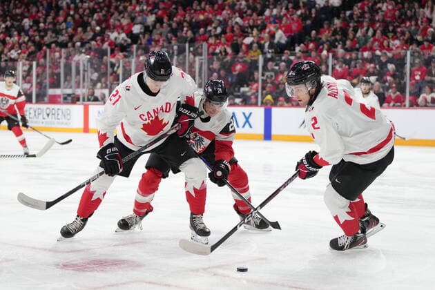 December 29, 2022, Halifax, NS, Canada: Canada™s Nathan Gaucher, left, and Nolan Allan, right, battle for the puck with Austria™s Tim Geifes during first period IIHF World Junior Hockey Championship action in Halifax on Thursday, December 29, 2022. Nathan Gaucher, Nolan Allan, Tim Geifes - ZUMAc35_ 20221229_zaf_c35_055 Copyright: xDarrenxCalabresex