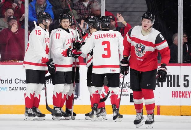 December 29, 2022, Halifax, NS, Canada: Canada™s Dylan Guenther, second from left, celebrates his goal with teammates in front of Austria™s Aron Summer during first period IIHF World Junior Hockey Championship action in Halifax on Thursday, December 29, 2022. Dylan Guenther, Aron Summer  - ZUMAc35_ 20221229_zaf_c35_056 Copyright: xDarrenxCalabresex