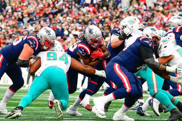 Jan 1, 2023; Foxborough, Massachusetts, USA; New England Patriots running back Rhamondre Stevenson (38) runs with the ball during the first half against the Miami Dolphins in Foxborough, Massachusetts. CSM Foxborough USA - ZUMAc04_ 20230101_zaf_c04_045 Copyright: xEricxCanhax