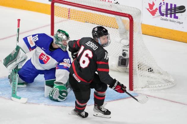 January 2, 2023, Halifax, NS, Canada: Canada s Connor Bedard, right, reacts after scoring a goal on Slovakia s goaltender Jan Korec during first period IIHF World Junior Hockey Championship quarterfinal action in Halifax, Monday, Jan. 2, 2023. Connor Bedard, Jan Korec - ZUMAc35_ 20230102_zaf_c35_102 Copyright: xDarrenxCalabresex