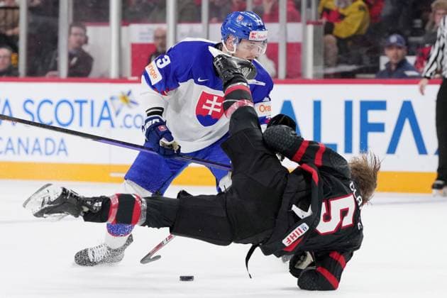 January 2, 2023, Halifax, NS, Canada: Canada s Brandt Clarke, right, is hit by Slovakia s Robert Baco during second period IIHF World Junior Hockey Championship quarterfinal action in Halifax, Monday, Jan. 2, 2023. Robert Baco, Brandt Clarke - ZUMAc35_ 20230102_zaf_c35_112 Copyright: xDarrenxCalabresex