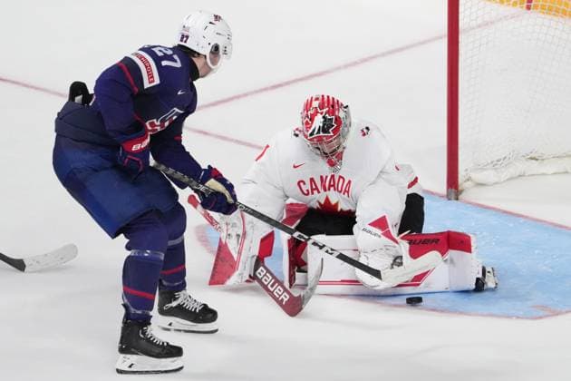 January 4, 2023, Halifax, NS, Canada: Canada goaltender Thomas Milic, right, makes a save on USA s Kenny Connors during second period IIHF World Junior Hockey Championship semifinal action in Halifax on Wednesday, January 4, 2023. Kenny Connors, Thomas Milic  - ZUMAc35_ 20230104_zaf_c35_095 Copyright: xDarrenxCalabresex