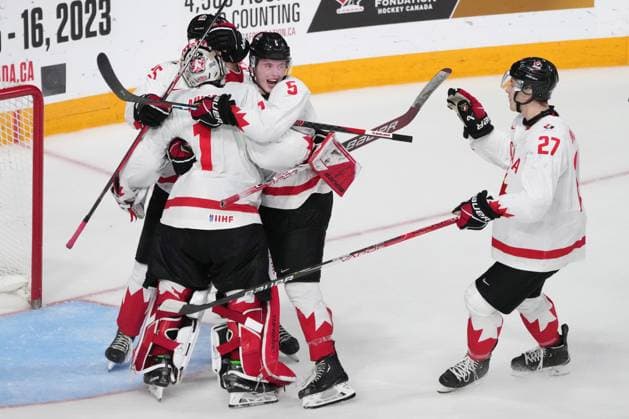 January 4, 2023, Halifax, NS, Canada: Canada s Thomas Milic, left to right, Brandt Clarke, Jack Matier and Jack Matier celebrate their win over USA during IIHF World Junior Hockey Championship semifinal action in Halifax on Wednesday, January 4, 2023. Thomas Milic, Brandt Clarke, Jack Matier - ZUMAc35_ 20230104_zaf_c35_113 Copyright: xDarrenxCalabresex
