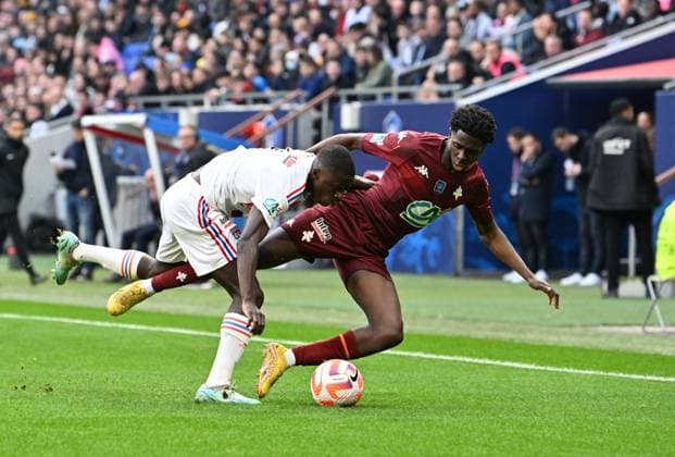 Sael Kumbedi (lyon) vs Joseph Nduquidi (metz) FOOTBALL: Olympique Lyonnais vs FC Metz - 32e Coupe de France - 07 01 2023 FredericChambert Panoramic 