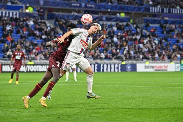 Nicolas Tagliafico (lyon) vs Joseph Nduquidi (metz) FOOTBALL: Olympique Lyonnais vs FC Metz - 32e Coupe de France - 07 01 2023 FredericChambert Panoramic 