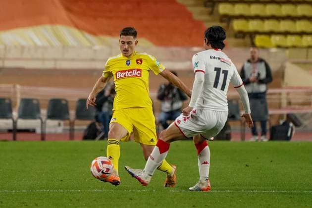Eric Vandenabeele (Rodez) - Takumi Minamino (AS Monaco) FOOTBALL : AS Monaco vs Rodez - 32eme de finale de Coupe de France - Monaco - 07 01 2023 NorbertScanella Panoramic 