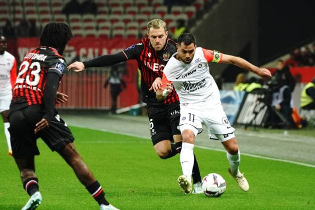 TÃ ji Savanier (Montpellier) - Aaron Ramsey (OGC Nice) FOOTBALL : OGC Nice vs Montpellier - Ligue 1 Ubereats - Nice - 11 01 2023 NorbertScanella Panoramic 