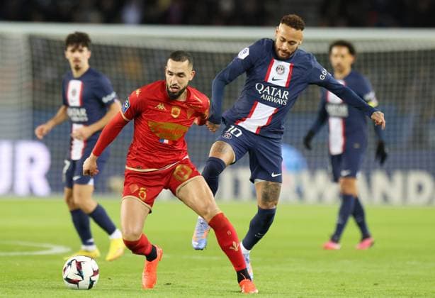 (230112) -- PARIS, Jan. 12, 2023 -- Paris Saint-Germain s Neymar (R) vies with Nabil Bentaleb of Angers during the French League 1 football match between Paris Saint-Germain FC and Angers at the Parc des Princes stadium in Paris, Jan. 11, 2023. ) (SP)FRANCE-PARIS-FOOTBALL-LIGUE 1-PSG VS ANGERS GaoxJing 