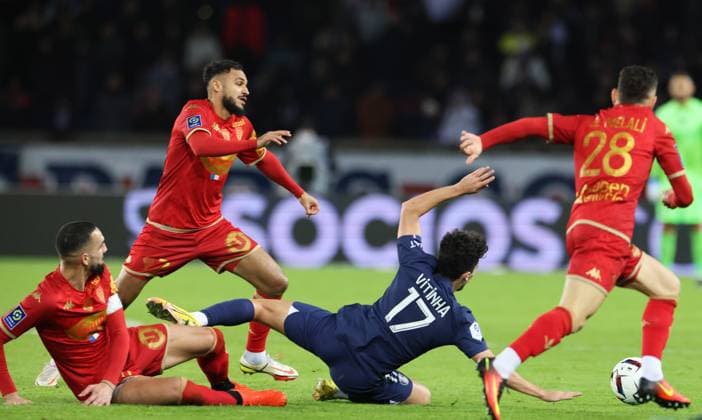 (230112) -- PARIS, Jan. 12, 2023 -- Paris Saint-Germain s Vitor Machado Ferreira (2nd R) vies for the ball during the French League 1 football match between Paris Saint-Germain FC and Angers at the Parc des Princes stadium in Paris, Jan. 11, 2023. ) (SP)FRANCE-PARIS-FOOTBALL-LIGUE 1-PSG VS ANGERS GaoxJing 