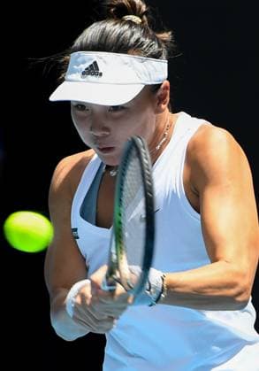 (230116) -- MELBOURNE, Jan. 16, 2023 -- Yuan Yue of China hits a return during the women s single 1st round match against Maria Sakkari of Greece at Australian Open tennis tournament, in Melbourne, Australia, Jan. 16, 2023. ) (SP)AUSTRALIA-MELBOURNE-TENNIS-AUSTRALIAN OPEN-DAY 1 GuoxLei 