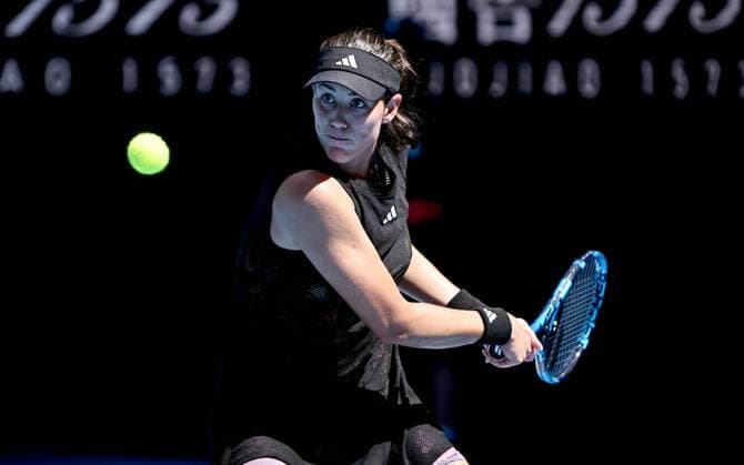 TENNIS AUSTRALIAN OPEN, Garbine Muguruza of Spain returns to Elise Mertens of Belgium during their first round singles match at the 2023 Australian Open tennis tournament at Melbourne Park in Melbourne, Tuesday, January 17, 2023. ( NO ARCHIVING, EDITORIAL USE ONLY, NO USE IN BOOKS WITHOUT CONSENT MELBOURNE VICTORIA AUSTRALIA  Copyright: xJOELxCARRETTx 20230117001753354428