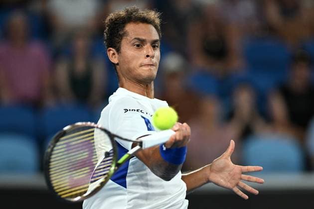 TENNIS AUSTRALIAN OPEN, Juan Pablo Varillas of Peru returns during his first round match against Alexander Zverev of Germany at the 2023 Australian Open tennis tournament at Melbourne Park in Melbourne, Tuesday, January 17, 2023. ( NO ARCHIVING, EDITORIAL USE ONLY, NO USE IN BOOKS WITHOUT CONSENT MELBOURNE VICTORIA AUSTRALIA  Copyright: xLUKASxCOCHx 20230117001753413251