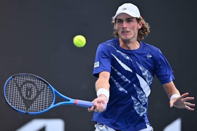 TENNIS AUSTRALIAN OPEN, Max Purcell of Australia returns during his 1st round singles match against Emil Ruusuvuori of Finland during 2023 Australian Open tennis tournament at Melbourne Park in Melbourne, Tuesday, January 17, 2023. ( NO ARCHIVING, EDITORIAL USE ONLY, NO USE IN BOOKS WITHOUT CONSENT MELBOURNE VICTORIA AUSTRALIA  Copyright: xJOELxCARRETTx 20230117001753457869