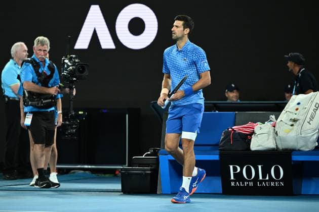 TENNIS AUSTRALIAN OPEN, Novak Djokovic of Serbia goes on to the court for his 1st round singles match against Roberto Carballes Baena of Spain during 2023 Australian Open tennis tournament at Melbourne Park in Melbourne, Tuesday, January 17, 2023. ( NO ARCHIVING, EDITORIAL USE ONLY, NO USE IN BOOKS WITHOUT CONSENT MELBOURNE VICTORIA AUSTRALIA  Copyright: xJOELxCARRETTx 20230117001753500408