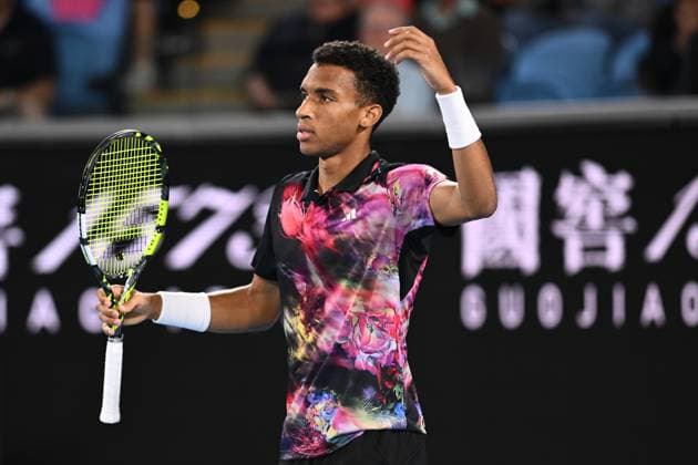 TENNIS AUSTRALIAN OPEN, Felix Auger-Aliassime of Canada reacts during his match against Alex Molcan of Slovakia during the 2023 Australian Open tennis tournament at Melbourne Park in Melbourne, Wednesday, January 18, 2023. ( NO ARCHIVING, EDITORIAL USE ONLY, NO USE IN BOOKS WITHOUT CONSENT MELBOURNE VICTORIA AUSTRALIA  Copyright: xJOELxCARRETTx 20230118001753723174