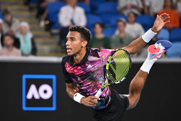 TENNIS AUSTRALIAN OPEN, Felix Auger-Aliassime of Canada in action against Alex Molcan of Slovakia during the 2023 Australian Open tennis tournament at Melbourne Park in Melbourne, Wednesday, January 18, 2023. ( NO ARCHIVING, EDITORIAL USE ONLY, NO USE IN BOOKS WITHOUT CONSENT MELBOURNE VICTORIA AUSTRALIA  Copyright: xJOELxCARRETTx 20230118001753723330
