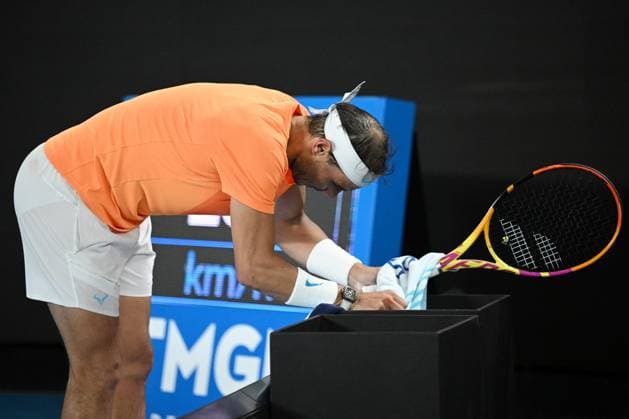 TENNIS AUSTRALIAN OPEN, Rafael Nadal of Spain recieves medical treatment during his match against Mackenzie McDonald of the USA during the 2023 Australian Open tennis tournament at Melbourne Park in Melbourne, Wednesday, January 18, 2023. ( NO ARCHIVING, EDITORIAL USE ONLY, NO USE IN BOOKS WITHOUT CONSENT MELBOURNE VICTORIA AUSTRALIA  Copyright: xJAMESxROSSx 20230118001753753553