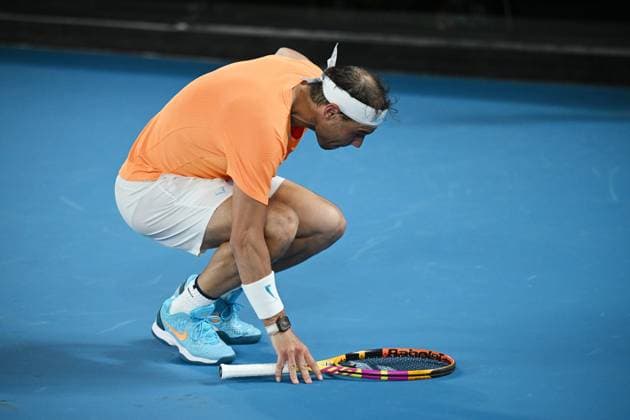 TENNIS AUSTRALIAN OPEN, Rafael Nadal of Spain recieves medical treatment during his match against Mackenzie McDonald of the USA during the 2023 Australian Open tennis tournament at Melbourne Park in Melbourne, Wednesday, January 18, 2023. ( NO ARCHIVING, EDITORIAL USE ONLY, NO USE IN BOOKS WITHOUT CONSENT MELBOURNE VICTORIA AUSTRALIA  Copyright: xJAMESxROSSx 20230118001753753655
