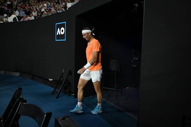 TENNIS AUSTRALIAN OPEN, Rafael Nadal of Spain emerges from a medical time out during his match against Mackenzie McDonald of the USA during the 2023 Australian Open tennis tournament at Melbourne Park in Melbourne, Wednesday, January 18, 2023. ( NO ARCHIVING, EDITORIAL USE ONLY, NO USE IN BOOKS WITHOUT CONSENT MELBOURNE VICTORIA AUSTRALIA  Copyright: xDIEGOxFEDELEx 20230118001753760802