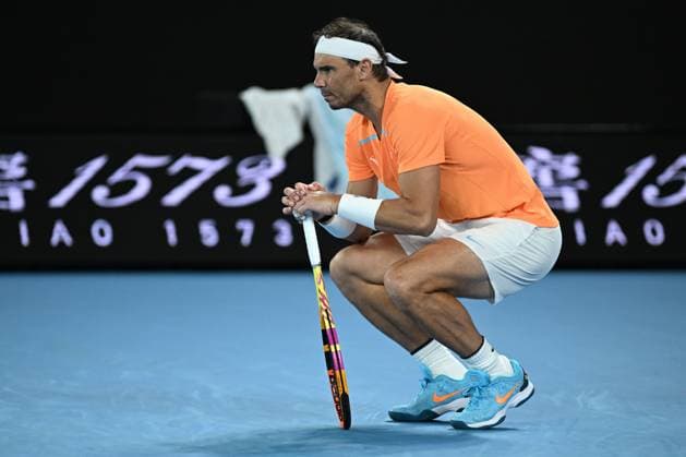 TENNIS AUSTRALIAN OPEN, Rafael Nadal of Spain bends over injured during his match against Mackenzie McDonald of the USA during the 2023 Australian Open tennis tournament at Melbourne Park in Melbourne, Wednesday, January 18, 2023. ( NO ARCHIVING, EDITORIAL USE ONLY, NO USE IN BOOKS WITHOUT CONSENT MELBOURNE VICTORIA AUSTRALIA  Copyright: xJAMESxROSSx 20230118001753762004