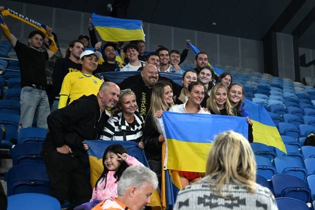 TENNIS AUSTRALIAN OPEN, Marta Kostyuk of Ukraine with supporters after winning her match against Olivia Gadecki of Australia during the 2023 Australian Open tennis tournament at Melbourne Park in Melbourne, Wednesday, January 18, 2023. ( NO ARCHIVING, EDITORIAL USE ONLY, NO USE IN BOOKS WITHOUT CONSENT MELBOURNE VICTORIA AUSTRALIA  Copyright: xLUKASxCOCHx 20230118001753861477