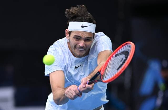 TENNIS AUSTRALIAN OPEN, Taylor Fritz of the USA returns during his match against Alexei Popyrin of Australia at the 2023 Australian Open tennis tournament at Melbourne Park in Melbourne, Thursday, January 19, 2023. ( NO ARCHIVING, EDITORIAL USE ONLY, NO USE IN BOOKS WITHOUT CONSENT MELBOURNE VICTORIA AUSTRALIA  Copyright: xJAMESxROSSx 20230119001754213976
