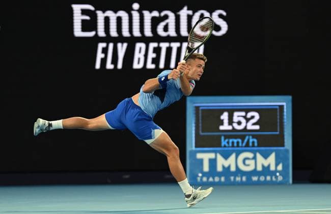 TENNIS AUSTRALIAN OPEN, Enzo Couacaud of France returns during his second round match against Novak Djokorvic of Serbia during the 2023 Australian Open tennis tournament at Melbourne Park in Melbourne, Thursday, January 19, 2023. ( NO ARCHIVING, EDITORIAL USE ONLY, NO USE IN BOOKS WITHOUT CONSENT MELBOURNE VICTORIA AUSTRALIA  Copyright: xLUKASxCOCHx 20230119001754254886