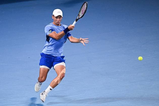 Mandatory Credit: Photo by James Gouley Shutterstock (13716770er) Enzo Couacaud in action during his second round match Australian Open, Day Four, Tennis, Melbourne Park, Melbourne, Australia - 19 Jan 2023 Australian Open, Day Four, Tennis, Melbourne Park, Melbourne, Australia - 19 Jan 2023 Copyright: xJamesxGouley Shutterstockx 13716770er