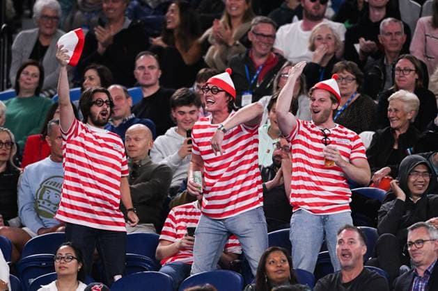 Mandatory Credit: Photo by James Gouley Shutterstock (13716770gi) Fans in the crowd cheering after Novak Djokovic lost a point during his second round match Australian Open, Day Four, Tennis, Melbourne Park, Melbourne, Australia - 19 Jan 2023 Australian Open, Day Four, Tennis, Melbourne Park, Melbourne, Australia - 19 Jan 2023 Copyright: xJamesxGouley Shutterstockx 13716770gi