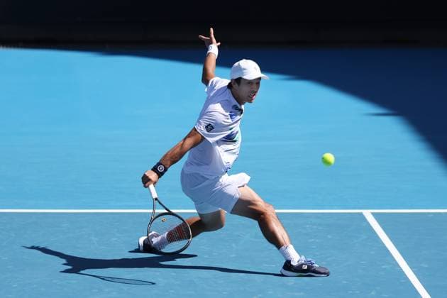 TENNIS AUSTRALIAN OPEN, Mackenzie McDonald of the USA in action during his 3rd round match against Yoshihito Nishioka of Japan at the 2023 Australian Open tennis tournament at Melbourne Park in Melbourne, Friday, January 20, 2023. ( NO ARCHIVING, EDITORIAL USE ONLY, NO USE IN BOOKS WITHOUT CONSENT MELBOURNE VICTORIA AUSTRALIA  Copyright: xDIEGOxFEDELEx 20230120001754629180