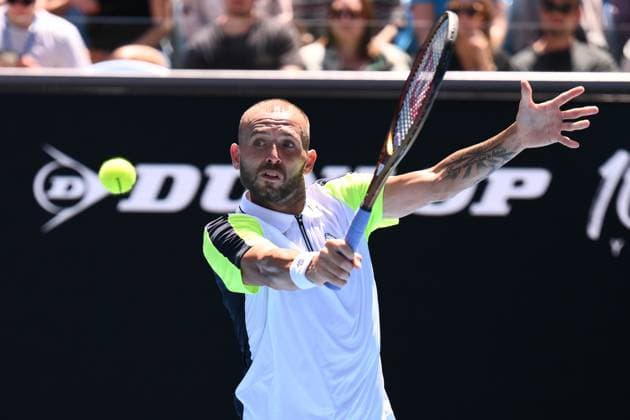 Mandatory Credit: Photo by James Gourley Shutterstock (13728737v) Dan Evans in action during his third round match Australian Open, Day Six, Tennis, Melbourne Park, Melbourne, Australia - 21 Jan 2023 Australian Open, Day Six, Tennis, Melbourne Park, Melbourne, Australia - 21 Jan 2023  Copyright: xJamesxGourley Shutterstockx 13728737v