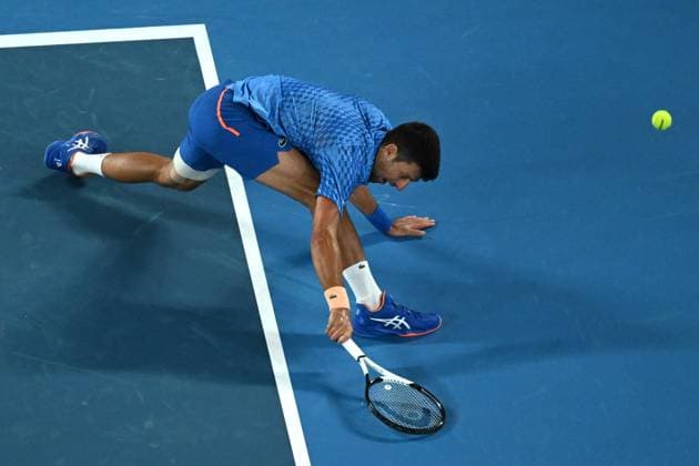 TENNIS AUSTRALIAN OPEN, Novak Djokovic of Serbia in action during his match against Grigor Dimitrov of Bulgaria during the 2023 Australian Open tennis tournament at Melbourne Park in Melbourne, Friday, January 1, 2021. ( NO ARCHIVING, EDITORIAL USE ONLY, NO USE IN BOOKS WITHOUT CONSENT MELBOURNE VICTORIA AUSTRALIA  Copyright: xLUKASxCOCHx 20230121001755030629