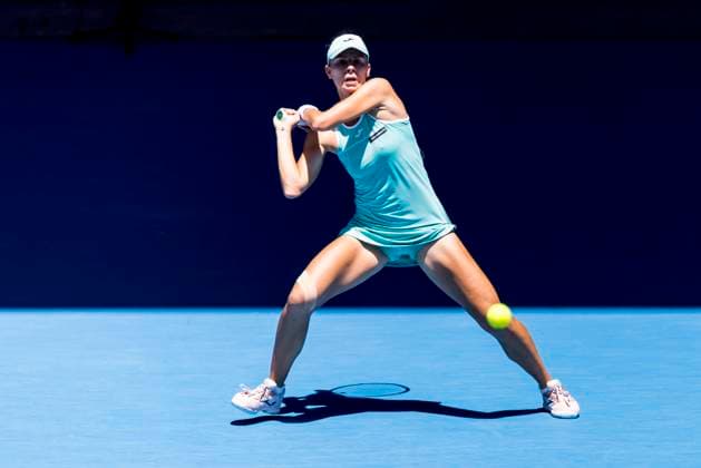 MELBOURNE, VIC - JANUARY 23: Magda Linette of Poland in action during Round 4 of the 2023 Australian Open on January 23 2023, at Melbourne Park in Melbourne, Australia. (Photo by Jason Heidrich Icon Sportswire) TENNIS: JAN 23 Australian Open Icon230123057