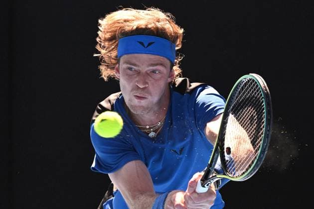 TENNIS AUSTRALIAN OPEN, Andrey Rublev of Russia returns to Holger Rune of Denmark during their fourth round match at 2023 Australian Open tennis championship at Melbourne Park in Melbourne, Monday, January 23. ( NO ARCHIVING, EDITORIAL USE ONLY, NO USE IN BOOKS WITHOUT CONSENT MELBOURNE VICTORIA AUSTRALIA  Copyright: xJAMESxROSSx 20230123001755790111