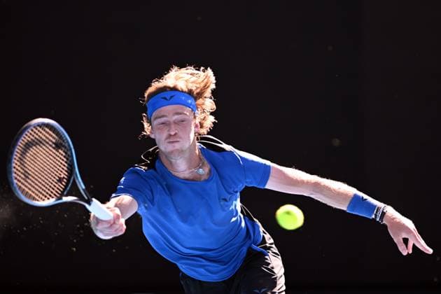 TENNIS AUSTRALIAN OPEN, Andrey Rublev of Russia returns to Holger Rune of Denmark during their fourth round match at 2023 Australian Open tennis championship at Melbourne Park in Melbourne, Monday, January 23. ( NO ARCHIVING, EDITORIAL USE ONLY, NO USE IN BOOKS WITHOUT CONSENT MELBOURNE VICTORIA AUSTRALIA  Copyright: xJAMESxROSSx 20230123001755798533