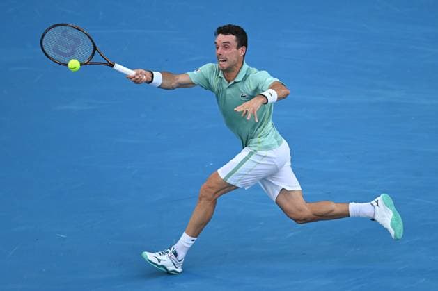 TENNIS AUSTRALIAN OPEN, Roberto Bautista Agut of Spain in action during his match against Tommy Paul of the United States during the 2023 Australian Open tennis tournament at Melbourne Park in Melbourne, Monday, January 23. ( NO ARCHIVING, EDITORIAL USE ONLY, NO USE IN BOOKS WITHOUT CONSENT MELBOURNE VICTORIA AUSTRALIA  Copyright: xLUKASxCOCHx 20230123001755809004